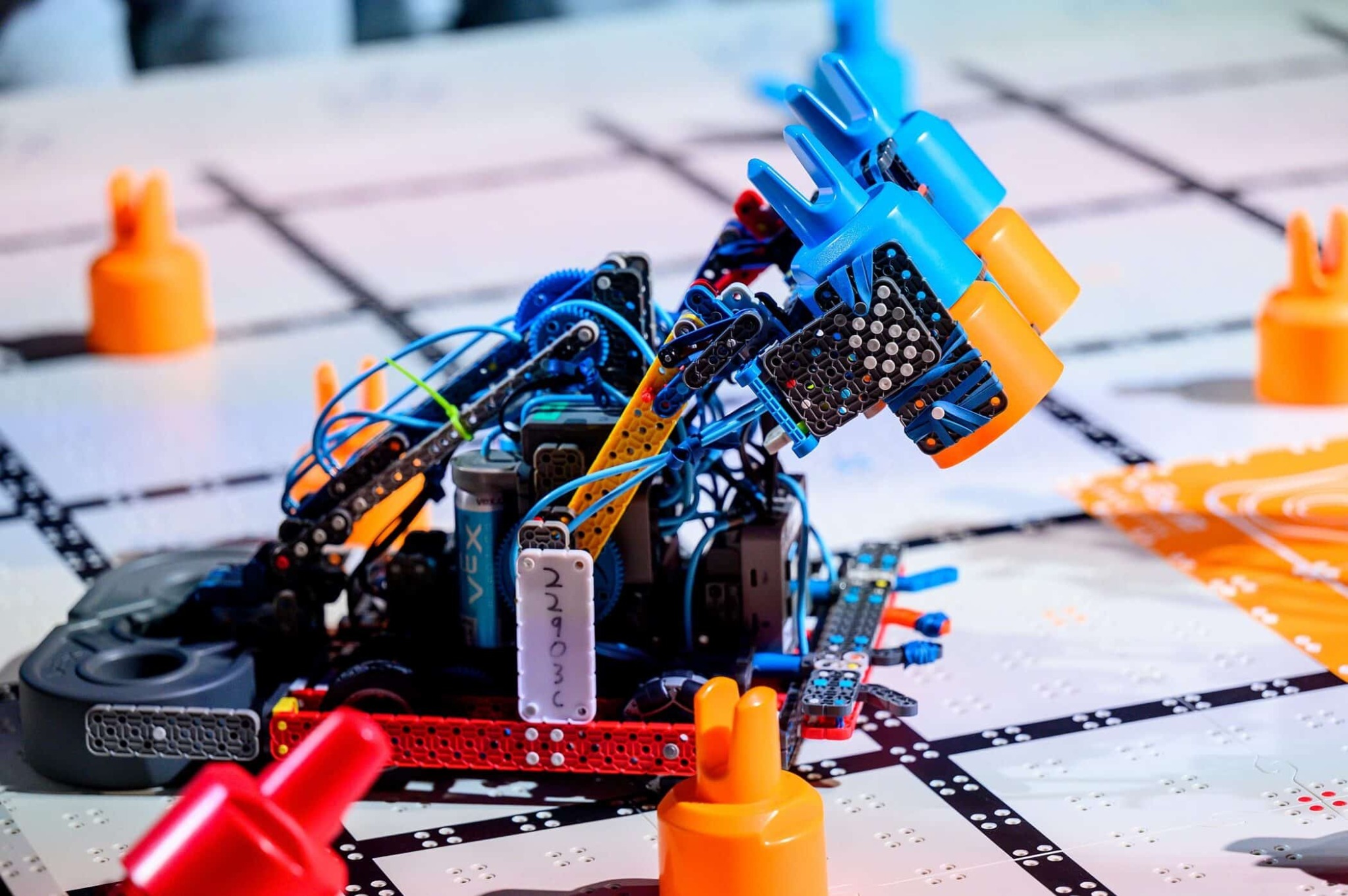 A complex robot handling game objects on a robotics field